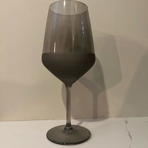 Four brand new two-toned wine glasses.